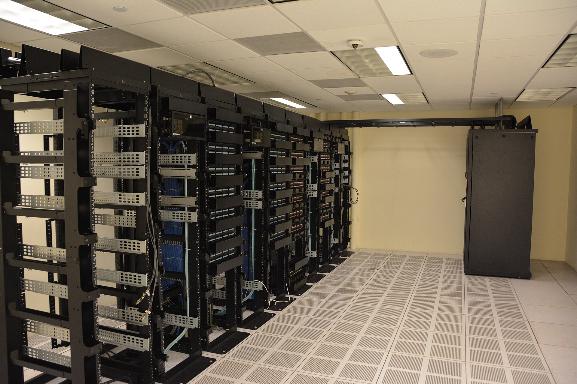Rows of servers in a data center, the source of the AI memory demand that is draining consumer DRAM supply