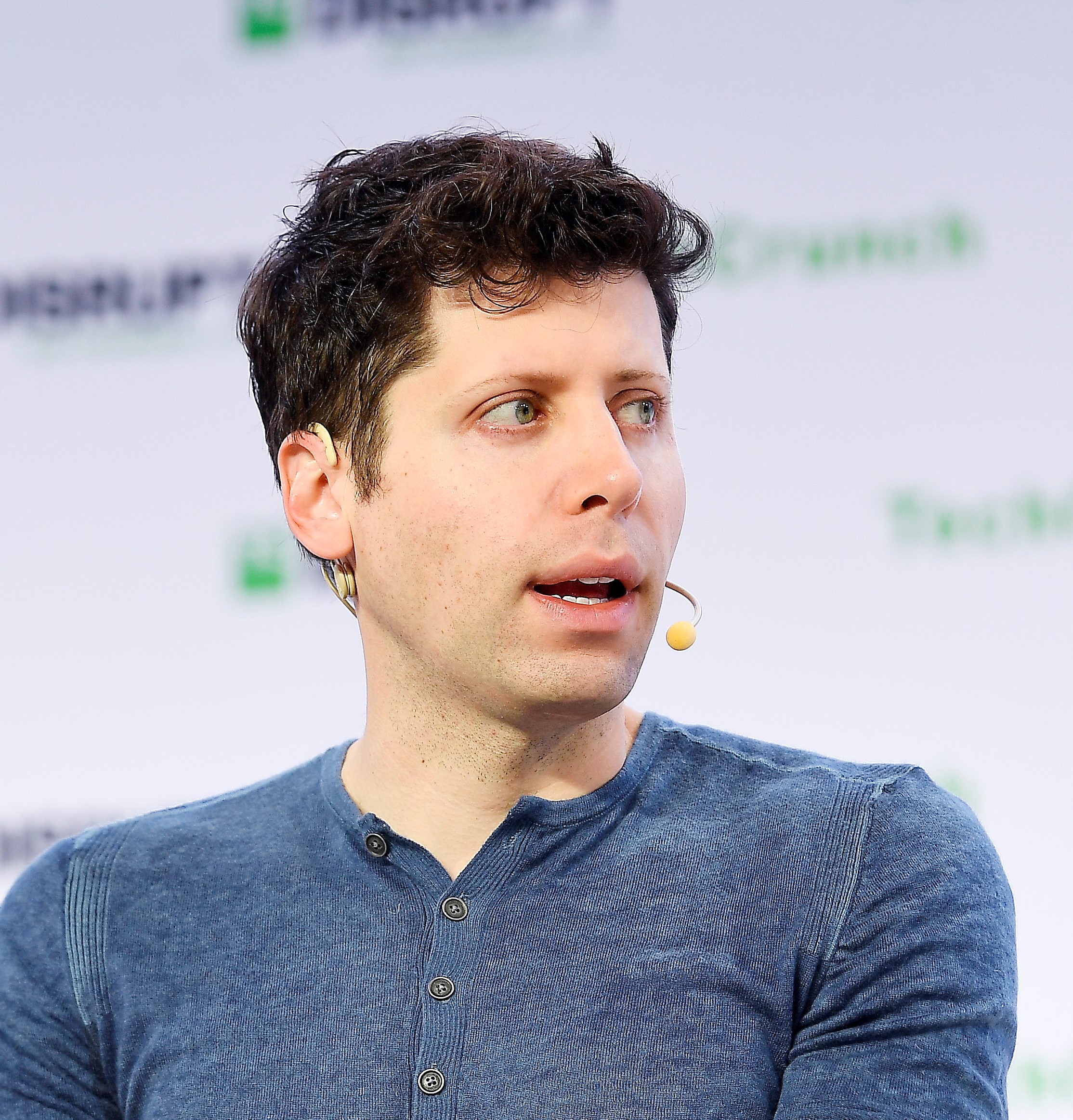 OpenAI CEO Sam Altman speaking at a conference — OpenAI is consolidating its products around the GPT-5.6 family