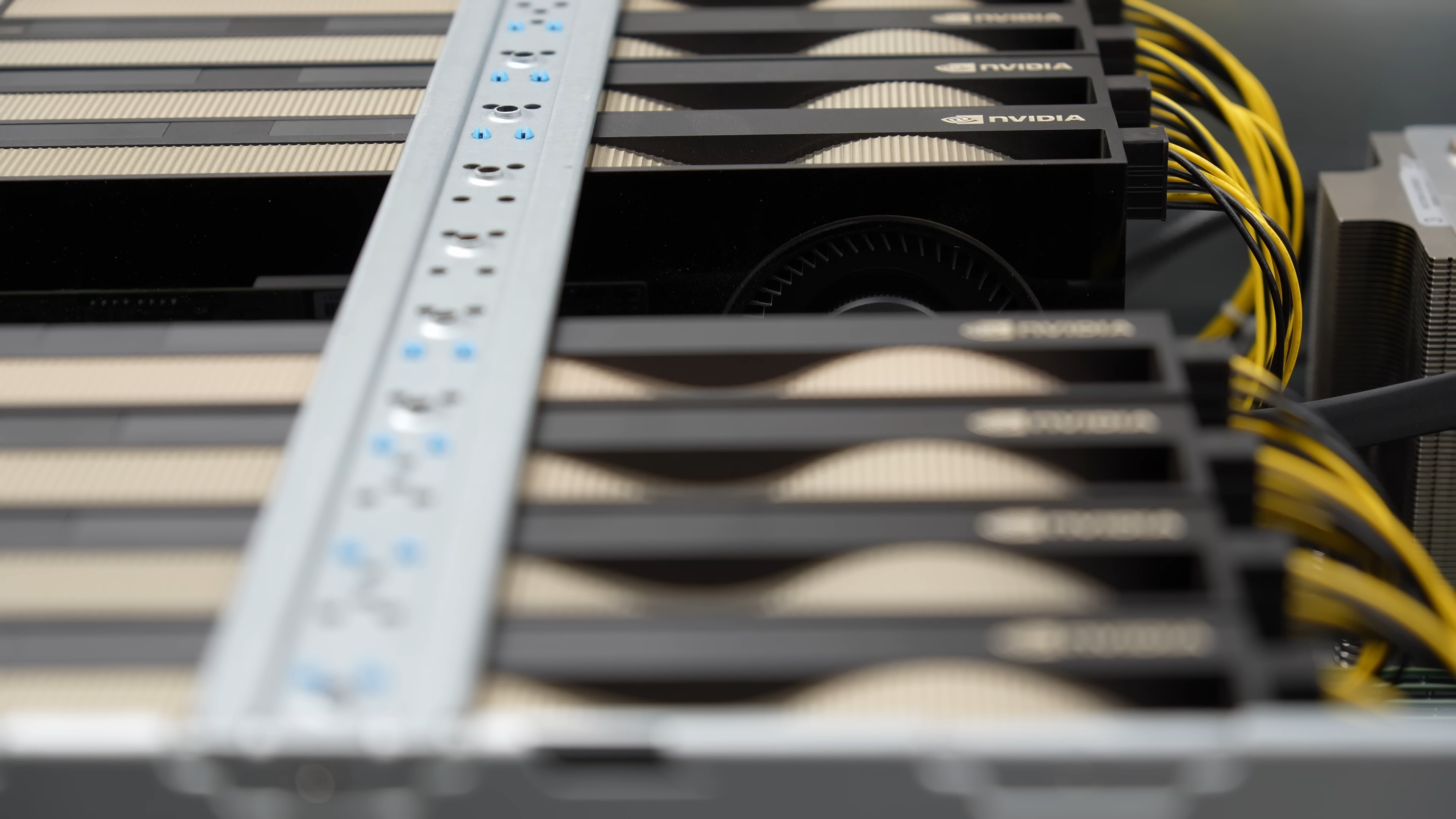 A rack-mounted server fitted with multiple NVIDIA GPUs, the class of hardware GPUBreach targets